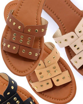 Slide sandal with rivet studs