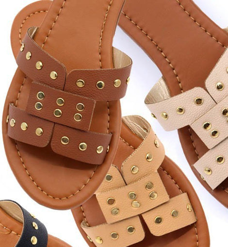 Slide sandal with rivet studs